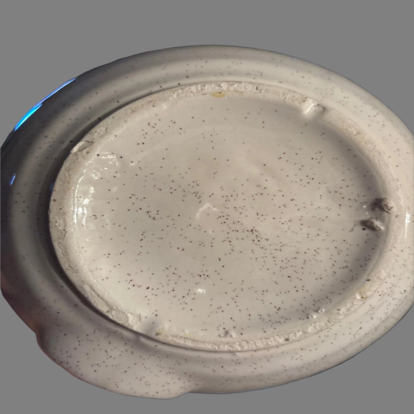 normal wear on bottom of handled jug