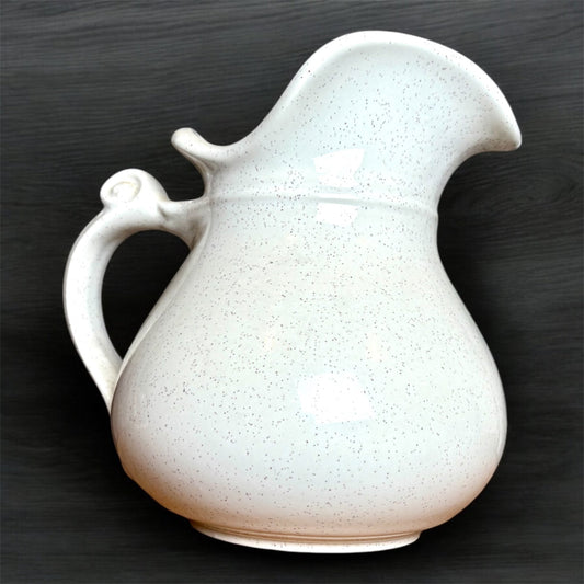 white speckly colonial styled water pitcher