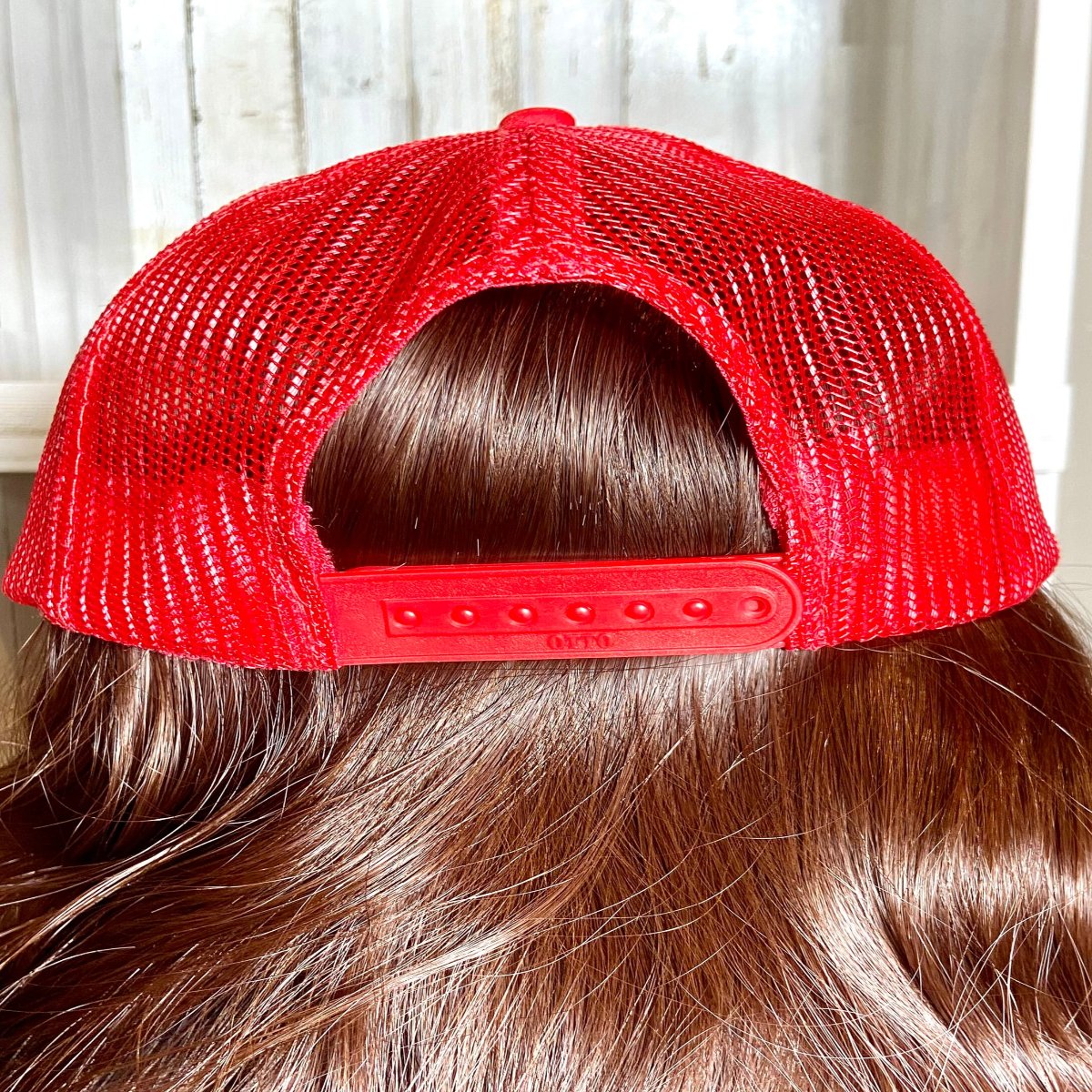 backside of mesh red adjustable cap