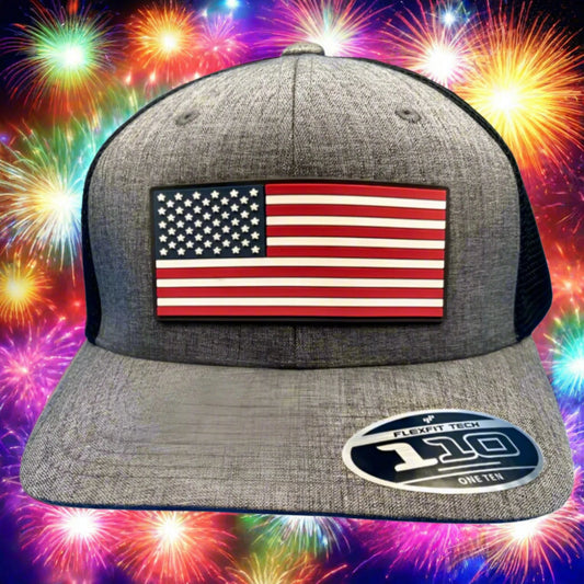 Gray cap with American flag patch on a colorful fireworks background